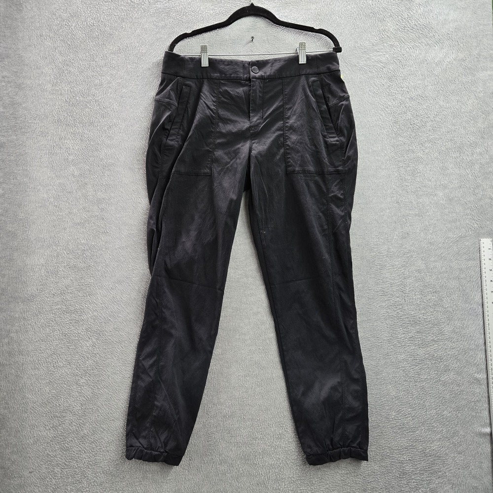 Athletaโ Women Activewear Pants 12 Black Nylon Spandex Cargo Snap Button Relaxed